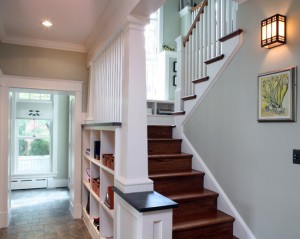 Charming-arts-and-crafts-home-interiors-for-craftsman-staircase-concept-with-white-wooden-multifunction-shelf-and-unique-wall-lamp-and-abstract-wall-painting-smart-inspirations