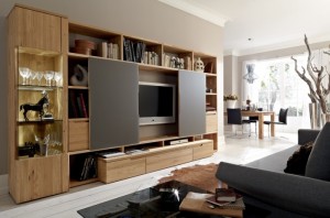 Light-Wood-Entertainment-Center-Wall-Unit-With-Black-Sofa