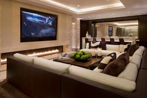 Luxury-Home-Cinema-design-fireplace-Screen-Flat-TV-sofa-cushion-table