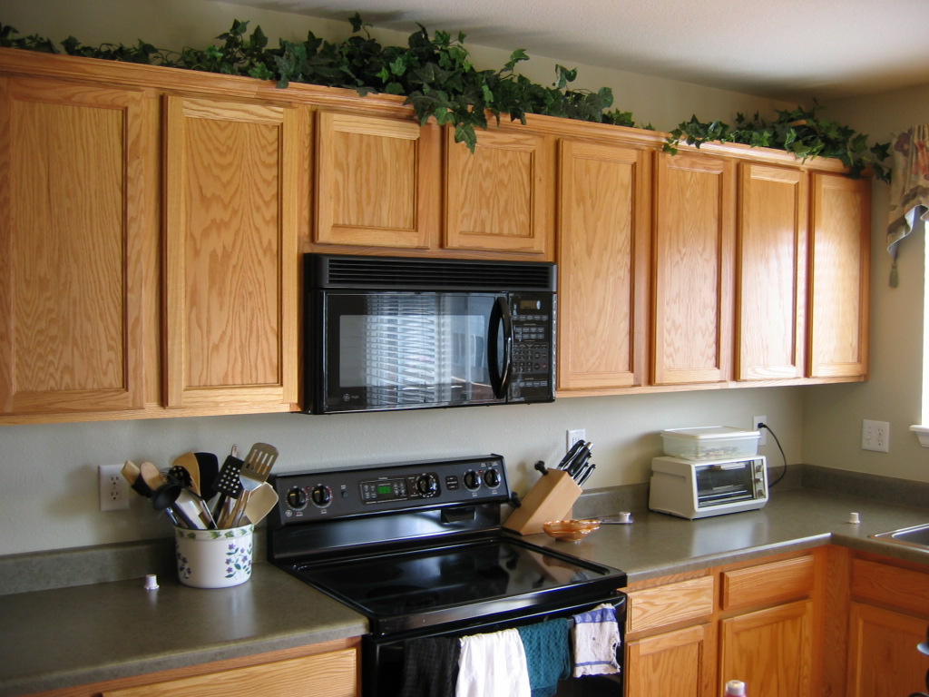 decorating kitchen with light wood cabinet