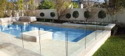 Swimming-Pool-Fence-Glass-Ideas-With-Cool-And-Beautiful-Design-Swimming-Pool-With-Fence-Surrounding-Decor